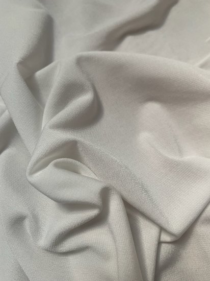 (image for) 60" Ivory ITY Knit Jersey Fabric Approximately 75 Yards On A Roll